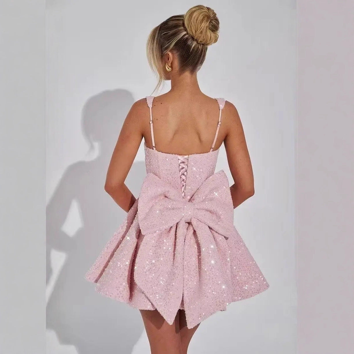 Strapless Sequined Mini Evening Dress With A Bow